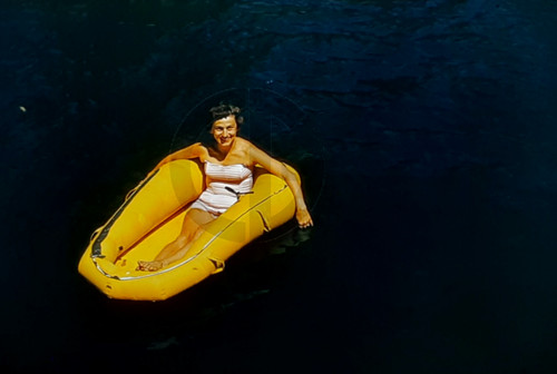 Smiling pretty lady floating - smiling,