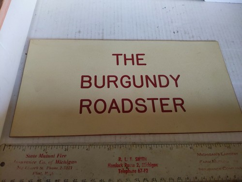 The burgundy roadster plastic