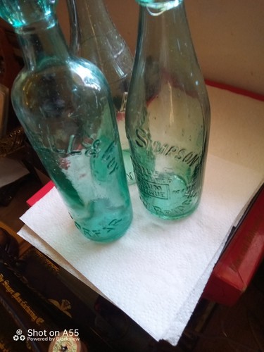 Green vintage glass bottles - green,