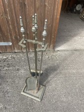 Cast metal fire companion set, comprising brush shovel and poker on stand