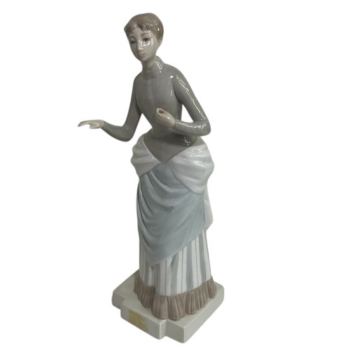 Nao lladro figurine - by,