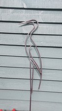 Heron garden sculpture hand