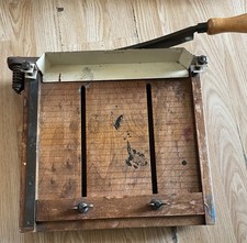 Vintage guillotine-style paper cutter