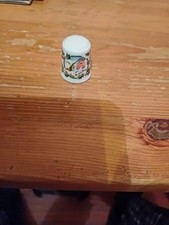 A China Thimble Which Shows A Picture Of Our Little Robin And By C. J & Sons. 