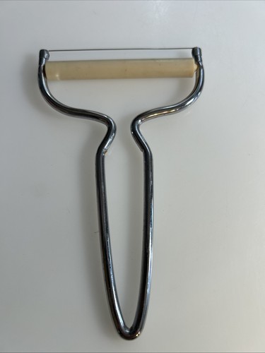Vintage metal cheese slicer - cheese,