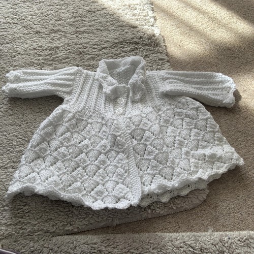 Hand knitted baby - hand,