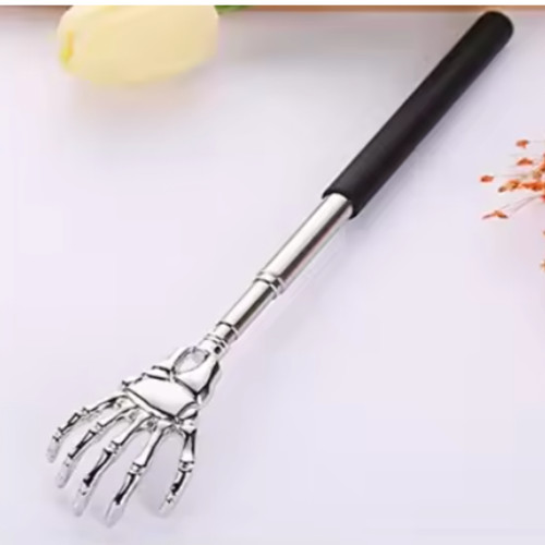 Skeleton rake back scratcher - /,
