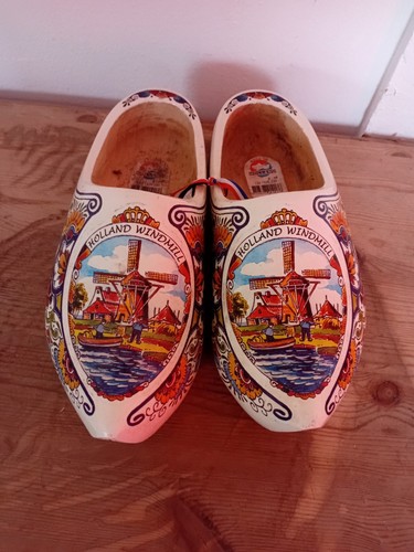Pair wooden clogs shoes - of,