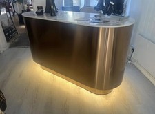 Curved Metallic Reception Desk