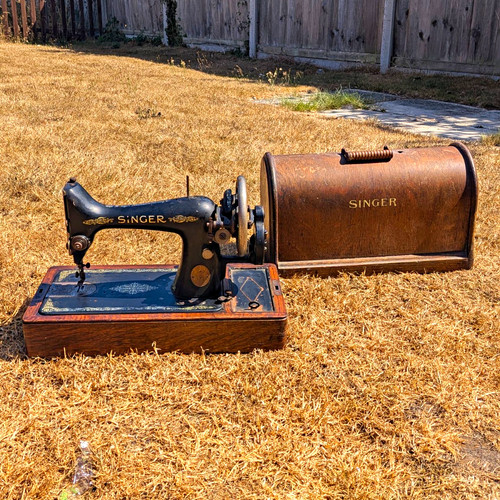 Vintage antique singer hand - antique,
