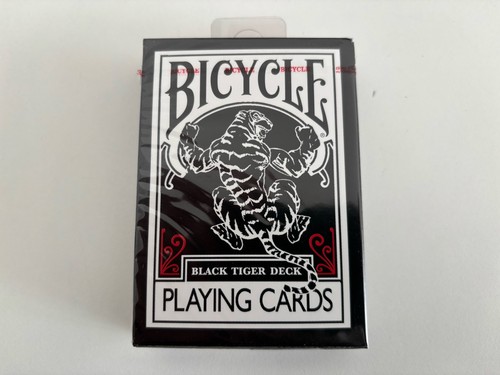 Bicycle black tiger playing - bicycle,