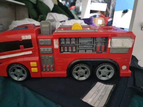 Toy fire truck does - truck, siren