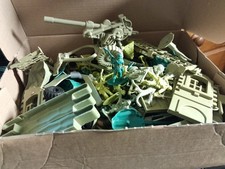 box of plastic toy soldiers