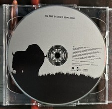 U2 - Best of 1990-2000 plus B sides CD/DVD Conbo Pack. Island Records.