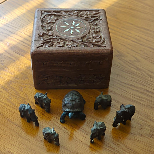 Carved wooden trinket box with - carved,