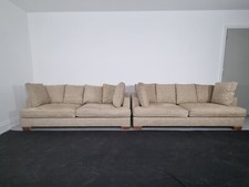 A pair of Flexform Eros sofas in delicate Sage green and Cream woven