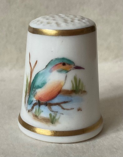 Hand painted signed bird - &,