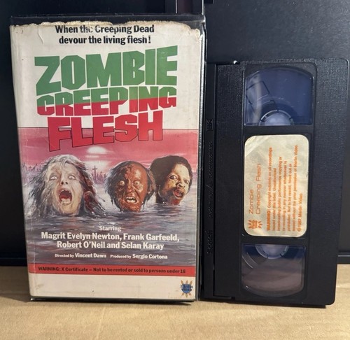 Zombie creeping flesh - “zombie, flesh”