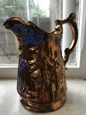 Antique lustre jug on gold