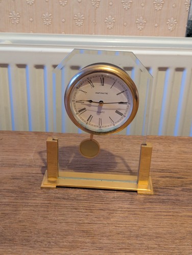 Infinite brass glass mantel - &,