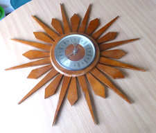 spectrum sunburst wall clock