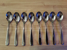 8 Dinner Spoons by Alessi
