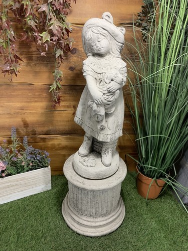 Stone garden girl with puppy - stone,