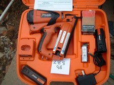 Paslode IM65 F16 angled Nail Gun 2 batterys gas nails charger case manuals servi