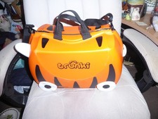 Orange tiger Trunki suitcase on wheels