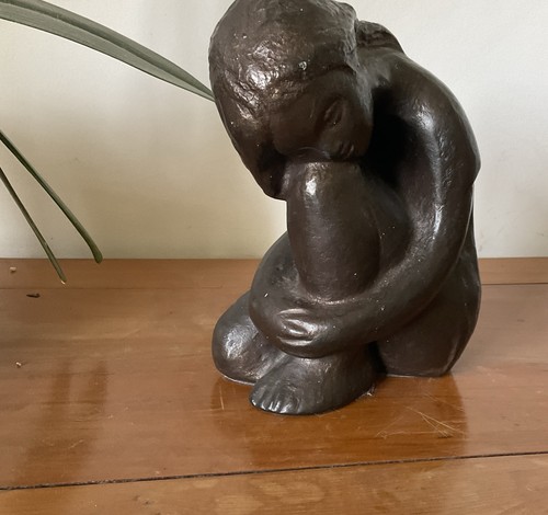 Heavy bronzed sculpture - a, of