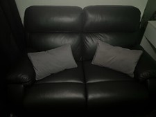 Black Leather Reclining sofa.