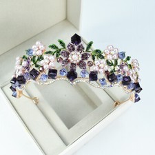 5cm tall purple - green, flower