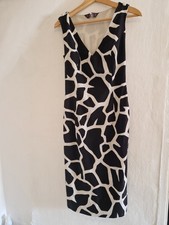 John GALLIANO  White &Black Mid Lengh Dress Slightly Pleated UK 8. Zip Opening.