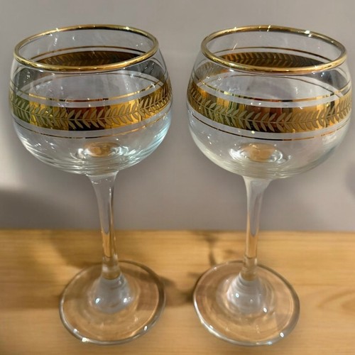 Pair 1950 gold decorated - of,