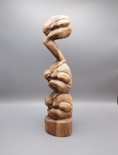 Large wooden yogi man weeping