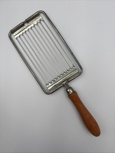 Vintage serrated slicer - slicer, tomado