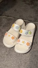 White Platform Crocs with Flower Jibbitz Size 4