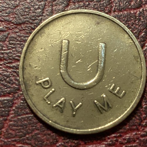 Vintage play brass token - me,