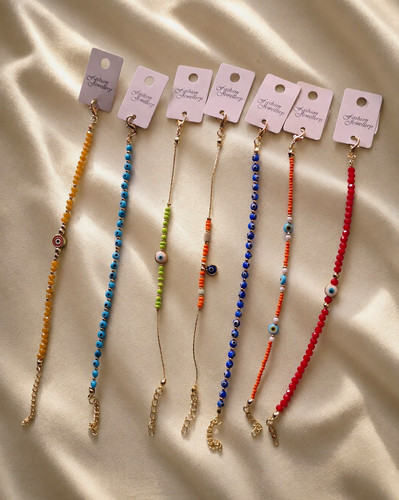 Multicolour beaded evil eye - multicolour,