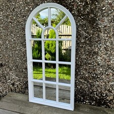 SOHO style arched white window