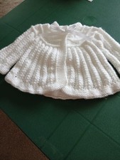 hand knitted matinee coat in