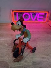 Goofy Riding a Tricycle Toy