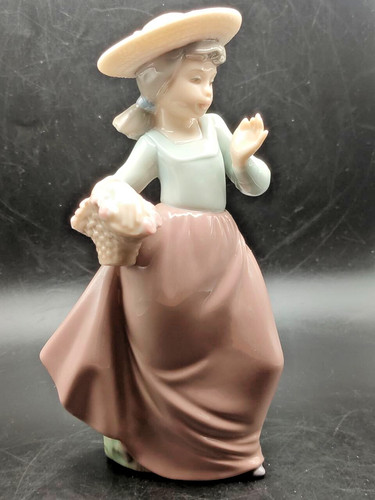 Nao lladro figurine - by,