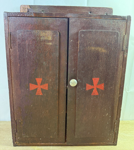Vintage wooden first aid - first,