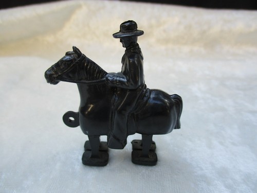 Vintage black plastic cowboy - plastic,