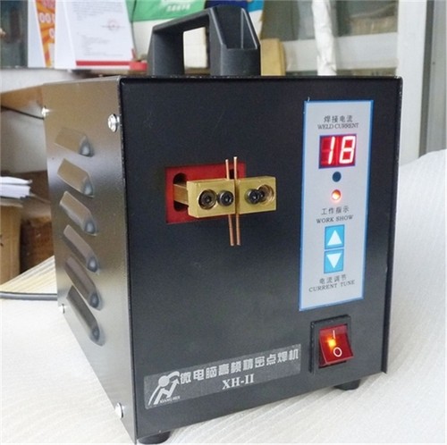 Hand held spot - welder, welding