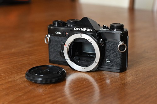 Olympus black 35mm slr - black,
