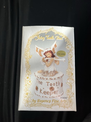 The tooth keeper ornament - the,