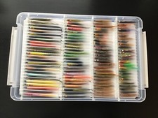 Tube fly storage box for