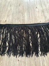 Long fringing tassel trim